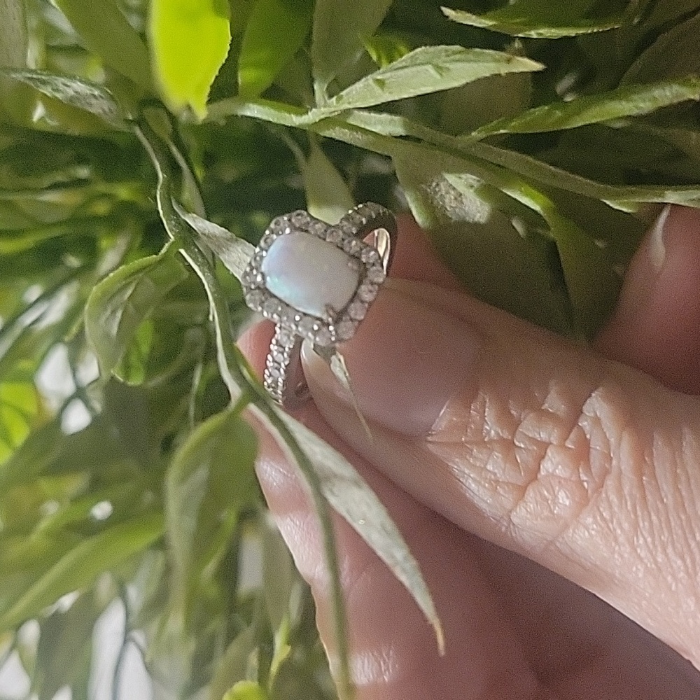 He went to Jared's Opal Sterling Silver Ring Halo